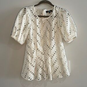 Eva Franco Anthropologie White top blouse size 8. Cut out details.